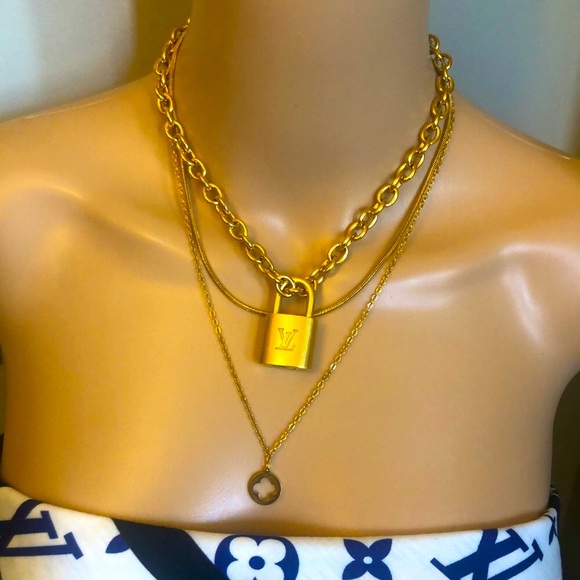 Repurposed vintage brass Louis Vuitton padlock 344 with layered style  necklace chains